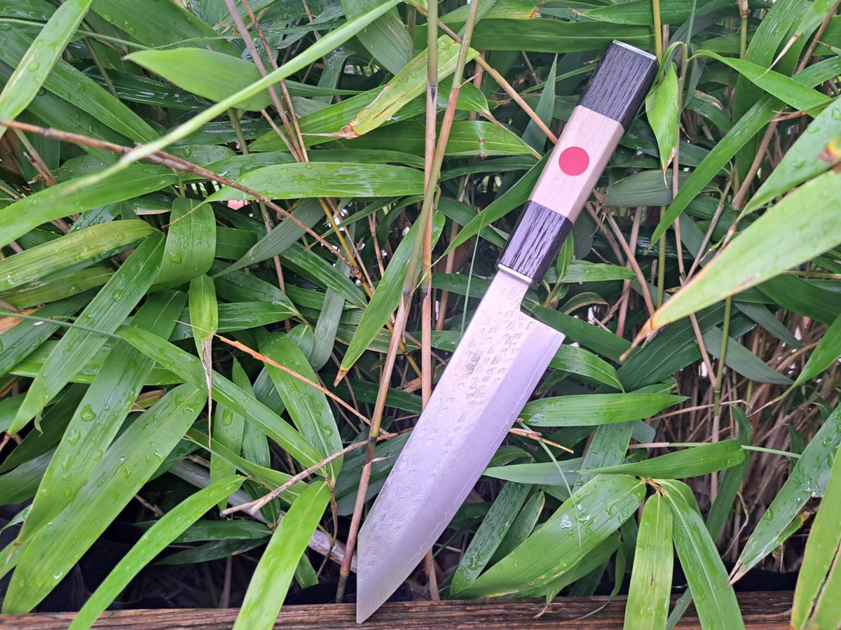 Custom knife with a elaborate work of Japanese flag art from Carsten W ...